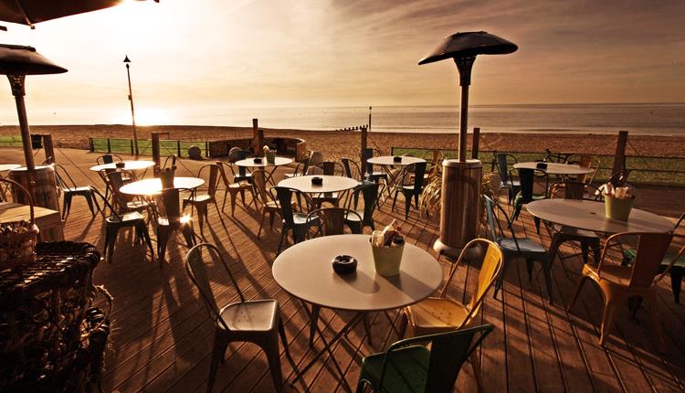 Idyllic image of Urban Reef's terrace overlooking the beach 